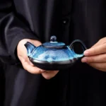 front view of 160ml blue rabbit fur Jian Zhan gongfu teapot with infuser