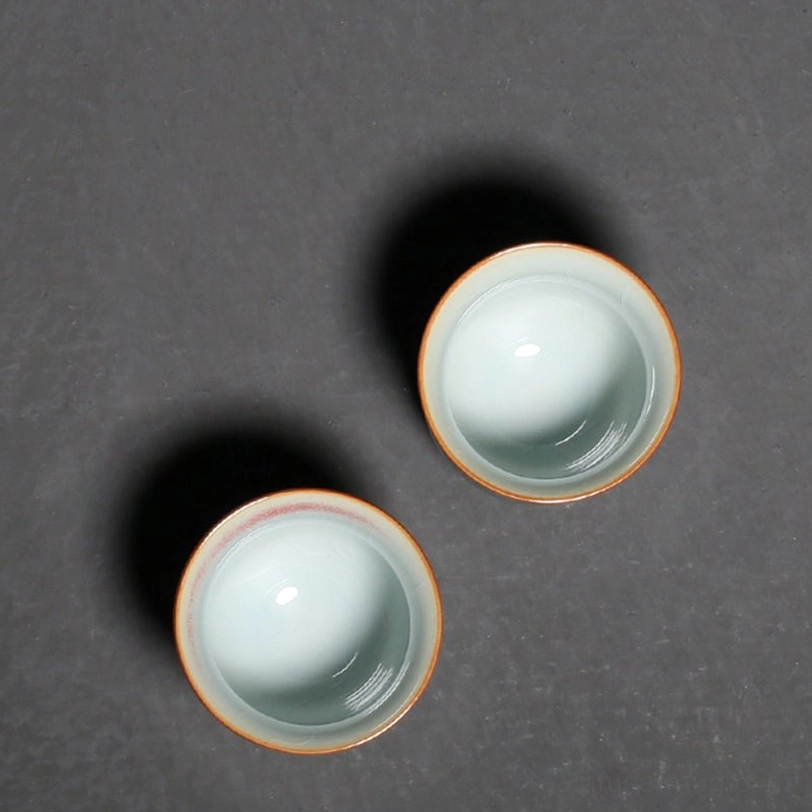 bottom view of chinese teacup showing cloud relief carving