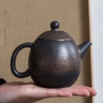 full side view of bronze gradient ceramic teapot with infuser 160ml