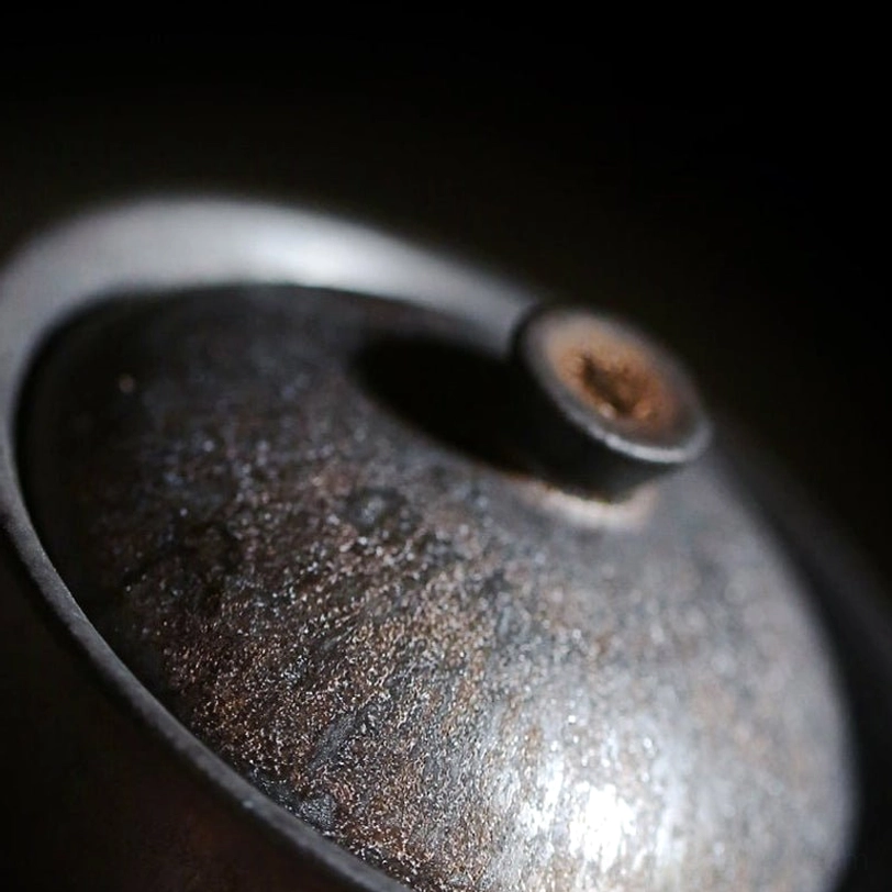 Bronze vintage gaiwan lid showing subtle metallic fleck details