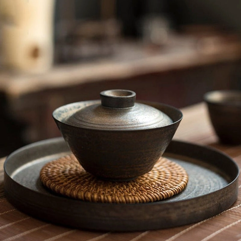 Smooth pouring demonstration for antique bronze Chinese gaiwan tea cup