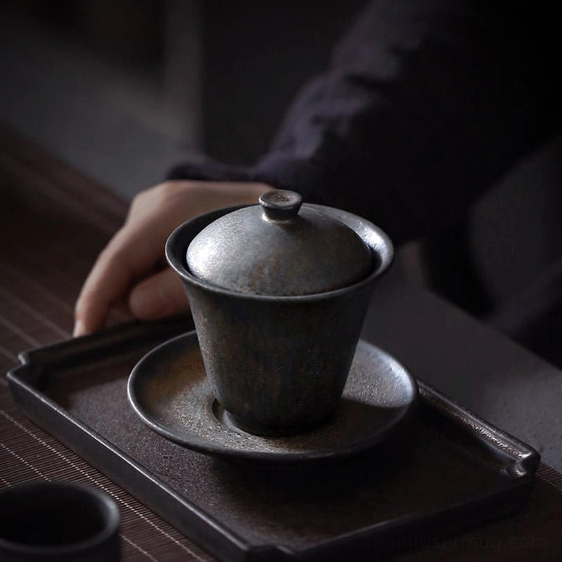 Top view of bronze vintage ceramic gaiwan with lid in place