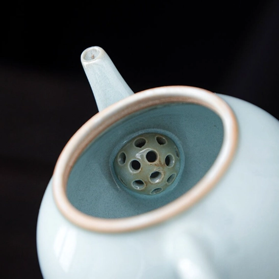 built-in infuser holes inside 100ml ceramic teapot