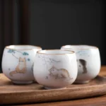 full product view of 120ml cat motif chinese crackle glaze ceramic tea cup