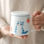 full product view of 12oz cat peach ceramic tea infuser mug with lid