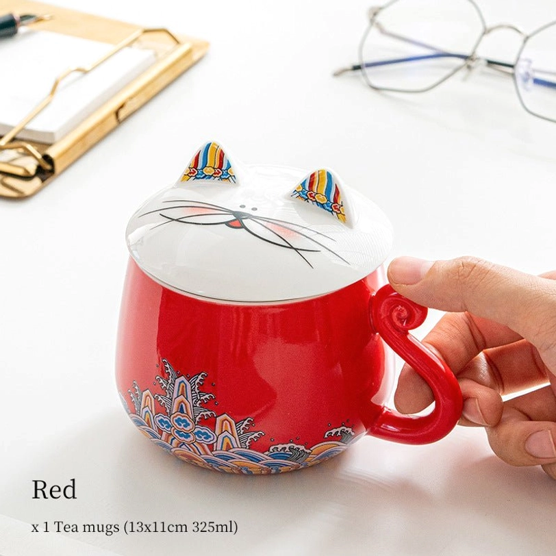 cat ceramic tea infuser mug placed on office desk as decor