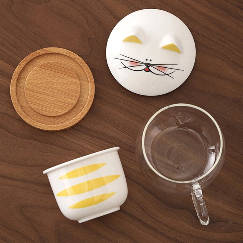 cat tea infuser mug side view showing cat tail glass handle