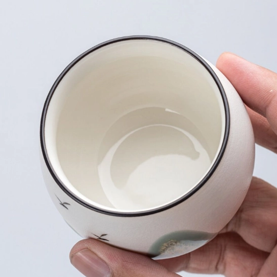 bottom of ceramic mountain tea cup showing smooth finish