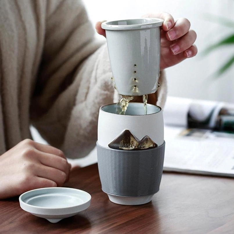 close up of ceramic tea infuser drainage holes for mountain tea infuser mug