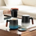 12oz landscape relief ceramic tea infuser mug with strainer lid and wooden handle main view