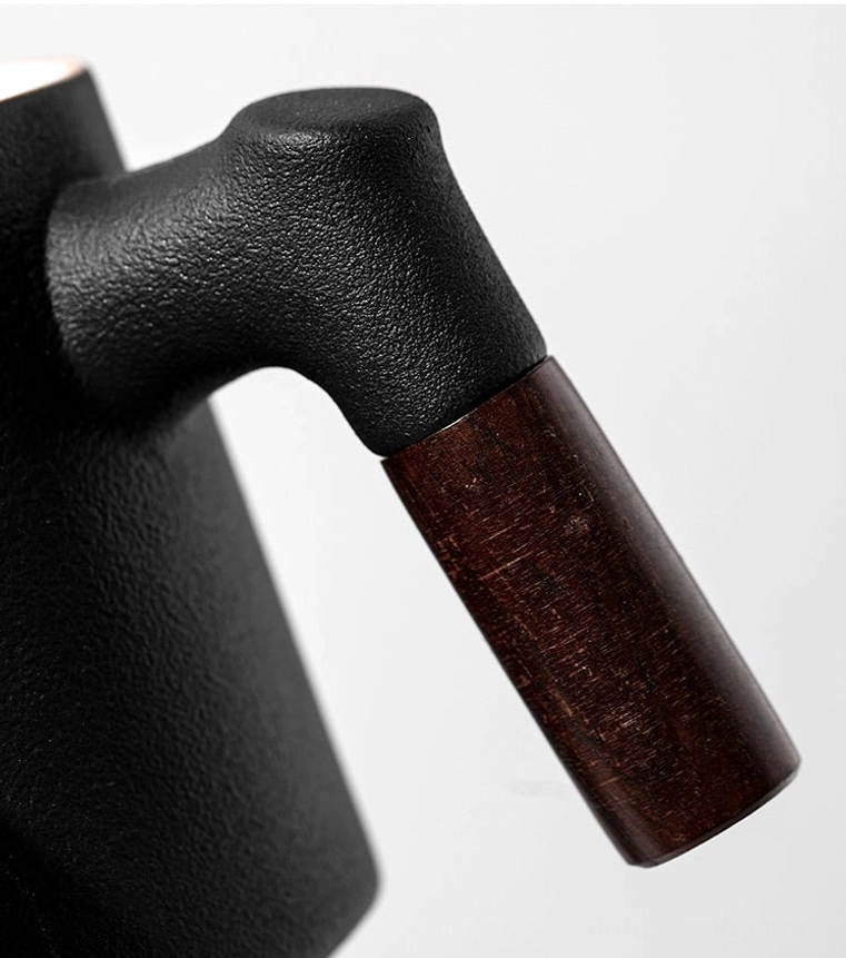 ceramic tea infuser mug with lid holding hot brewed loose leaf tea