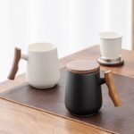 full view of 400ml ceramic tea mug with wooden handle and infuser