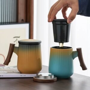 large ceramic tea mug with wooden handle and tea infuser main product view