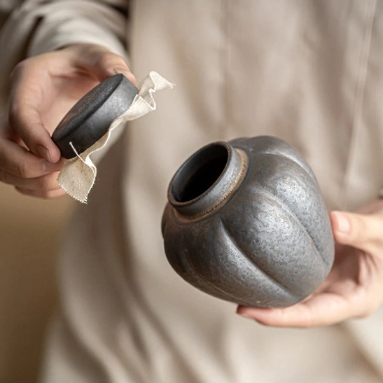 Close up of the faceted texture on the ceramic tea storage canister
