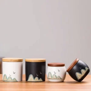 ceramic tea storage canisters with black and white landscape design