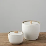 white ceramic airtight tea storage jar with natural wood handle