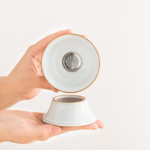 Handcrafted kaolin ceramic tea strainer with stand full product view