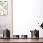 complete ceramic travel tea set with mountain landscape design unboxed