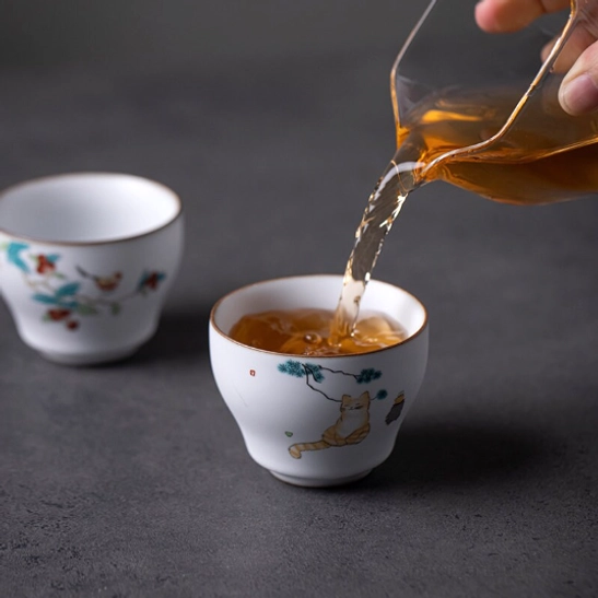 detailed view of gold rim on decorative chinese ceramic tea cup