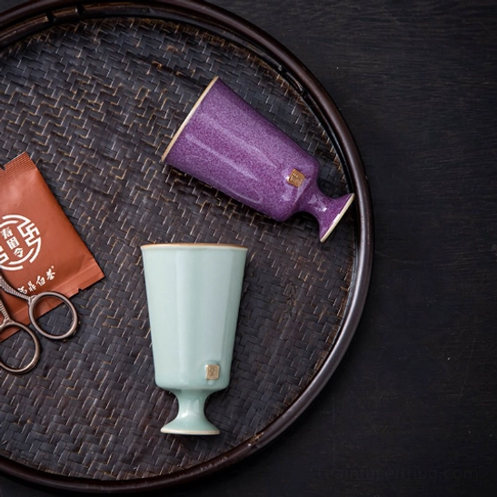 Close up of decorative accent mark on Chinese high foot tea cup