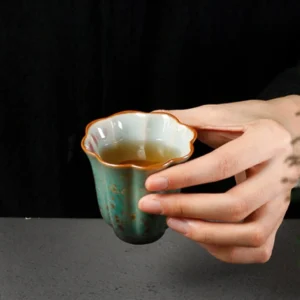 Collection of lotus design Chinese ceramic gongfu tea cups in multiple styles