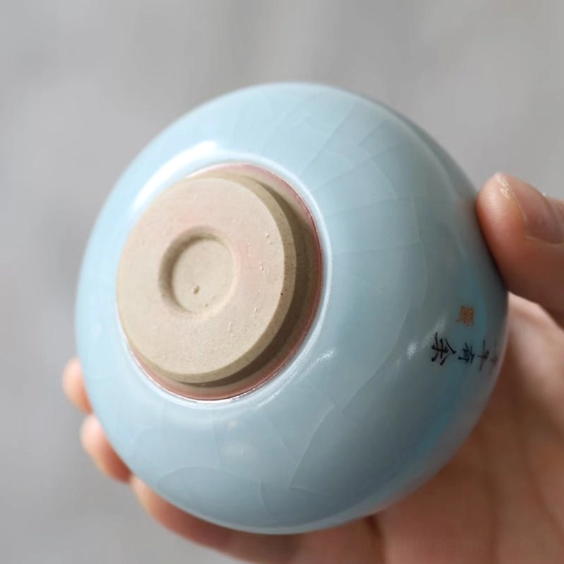 size comparison of three sizes of koi chinese porcelain tea cups