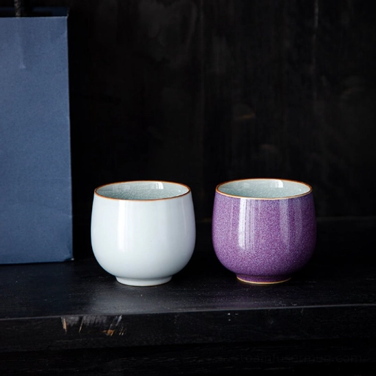 top view of purple Chinese porcelain tea cup showing crackle glaze inner wall