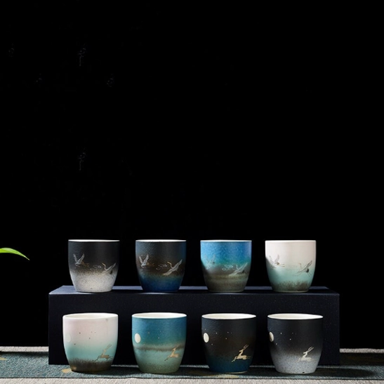 close up of deer and moon motif on ceramic tea cup