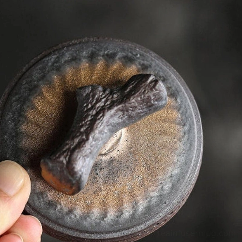 close up of gaiwan tea cup textured ceramic surface