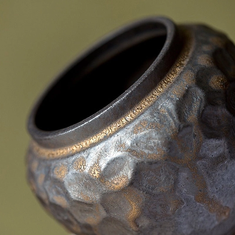 close up of hammered texture on ceramic tea storage canister