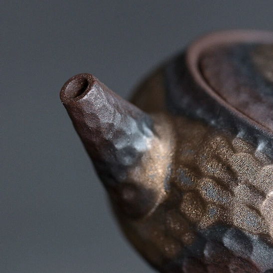 close up of textured hammered finish on 250ml vintage japanese clay teapot