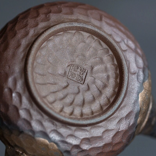 close up of precision spout on 250ml vintage japanese side handle clay teapot