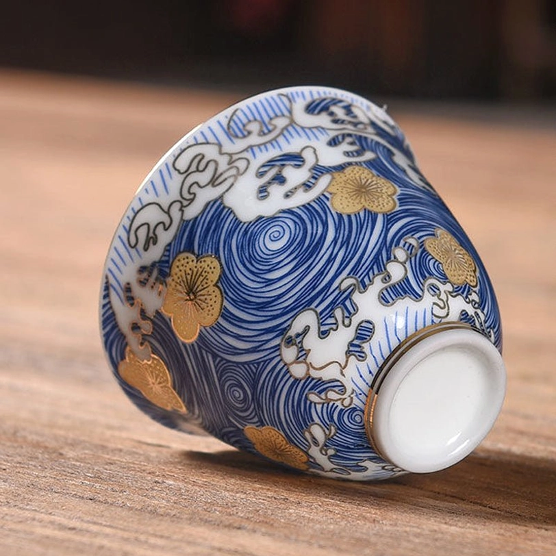 Close up of wave and cloud pattern on Chinese porcelain tea cup