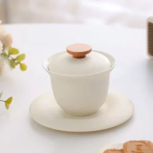 full set of creamy white porcelain gaiwan tea cup with wooden lid knob on wooden tray
