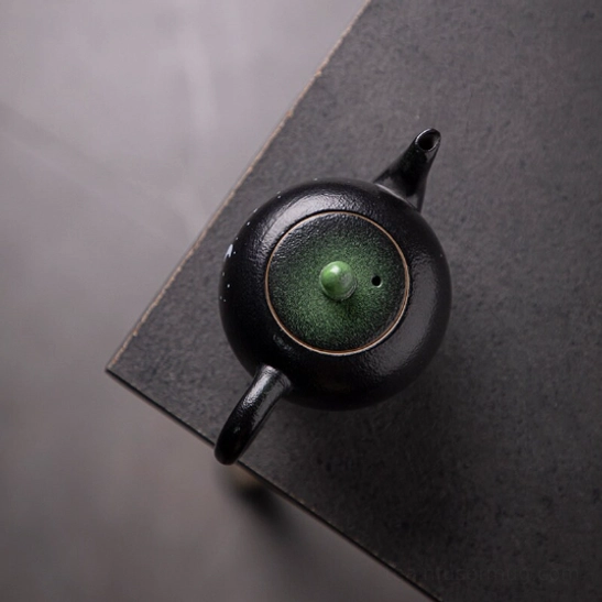 ergonomic handle of compact 200ml deer ceramic teapot