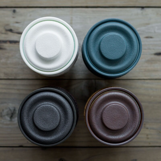 portable travel tea mug disassembled showing cup, lid and infuser