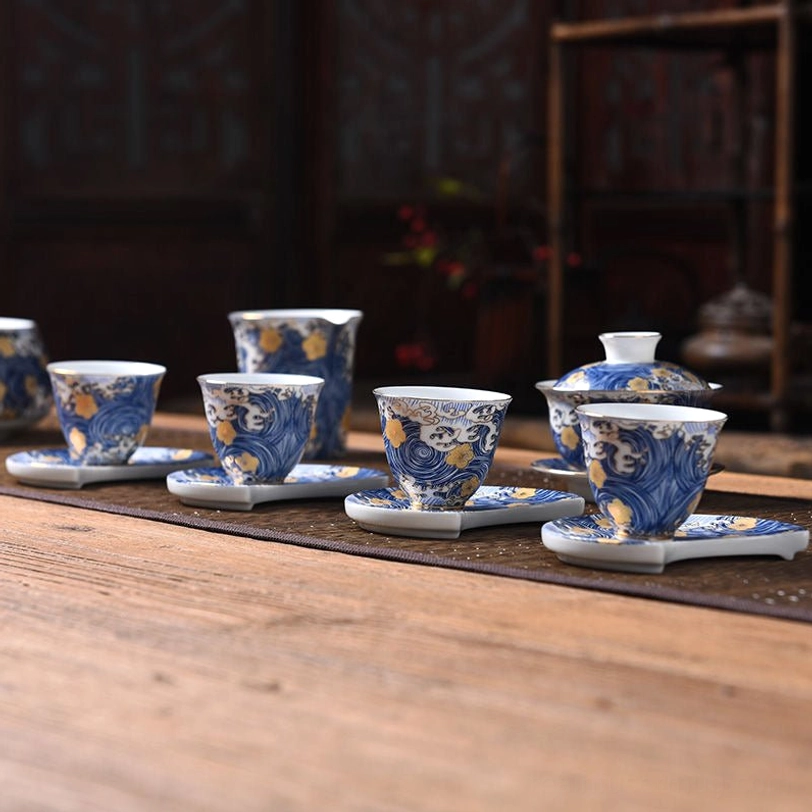 Elegant blue and gold Chinese tea cup with traditional motifs