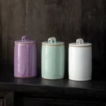 Airtight ceramic tea storage canister with elephant handle front view