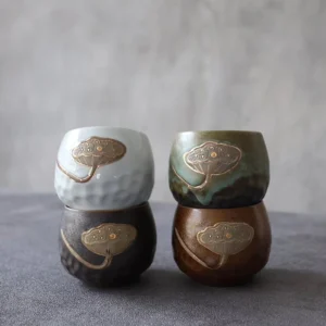 side profile of embossed lotus porcelain chinese tea cup