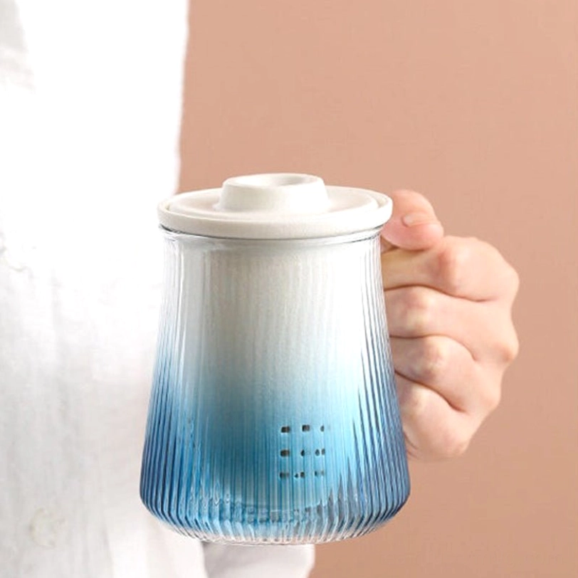 close up of fine hole ceramic tea infuser for personal glass tea mug