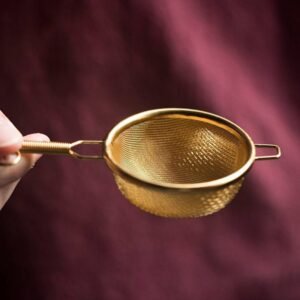 Fine mesh small metal tea strainer spoon gold variant front view