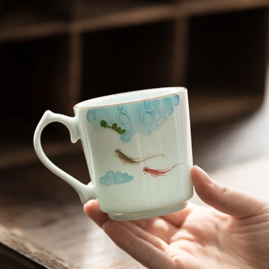 Fish motif modern Chinese tea cup front view