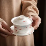 side view of 150ml fish pattern porcelain gaiwan tea cup