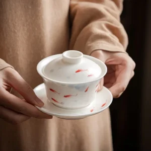 side view of 150ml fish pattern porcelain gaiwan tea cup