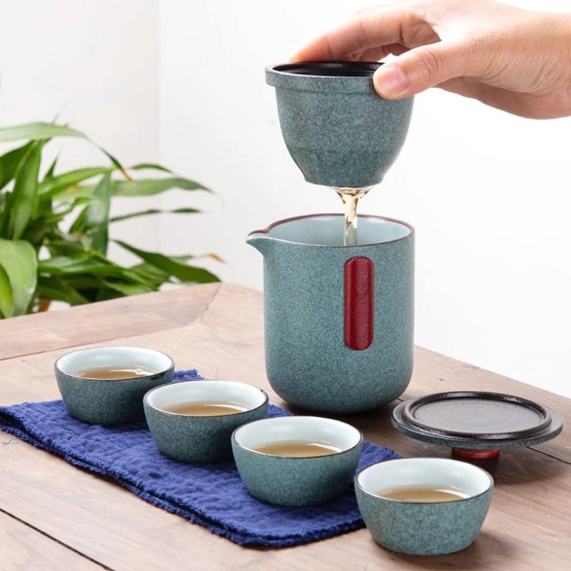 four teacups for travel tea set with white inner glaze