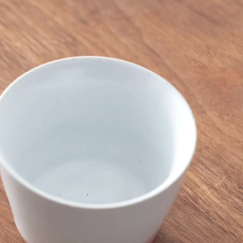 four unique designed chinese porcelain tea cups arranged together with different motifs