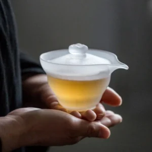 150ml frosted glass gaiwan held in two hands to show size