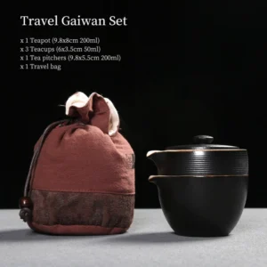 Full 6 piece black and white ceramic travel tea set displayed with brown carry bag