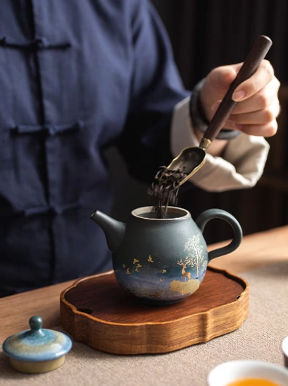 golden deer ceramic teapot with infuser full product shot