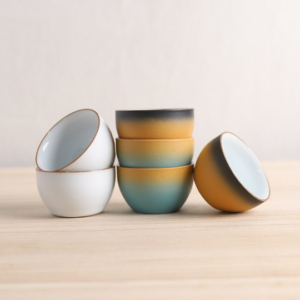 full set of two gradient ceramic chinese tea bowls on white background